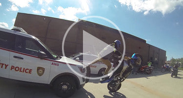 STUNT RIDERS STUNT ON COP CARS!!