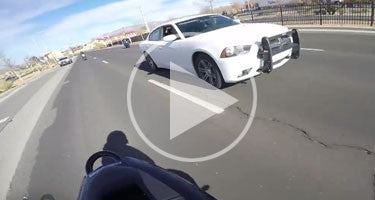 2 STUNT BIKES VS CHARGER COP CAR!