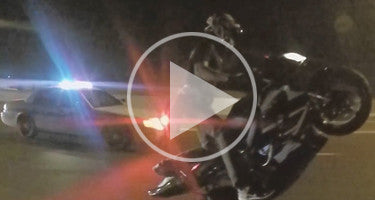 STUNT RIDER WHEELIES RIGHT NEXT TO COP!!!!!