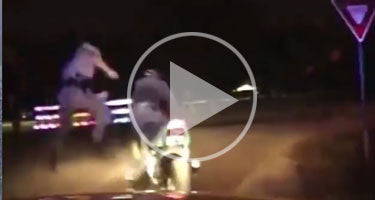 OFFICER KICKS MOTORCYCLE OFF BIKE DURING STOP!!!