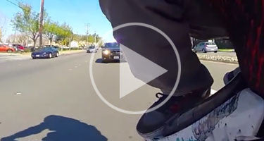 TWO GOPRO ANGLES FILM STUNT RIDER VS CHARGER COP CAR!